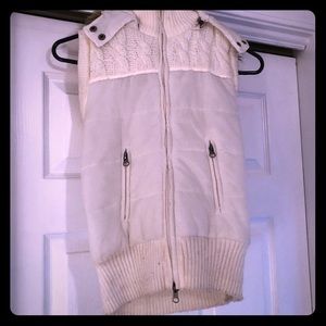 Beige vest with faux fur hood